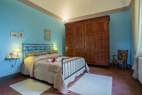 Slaapkamer in luxe vakantiehuis in Toscane