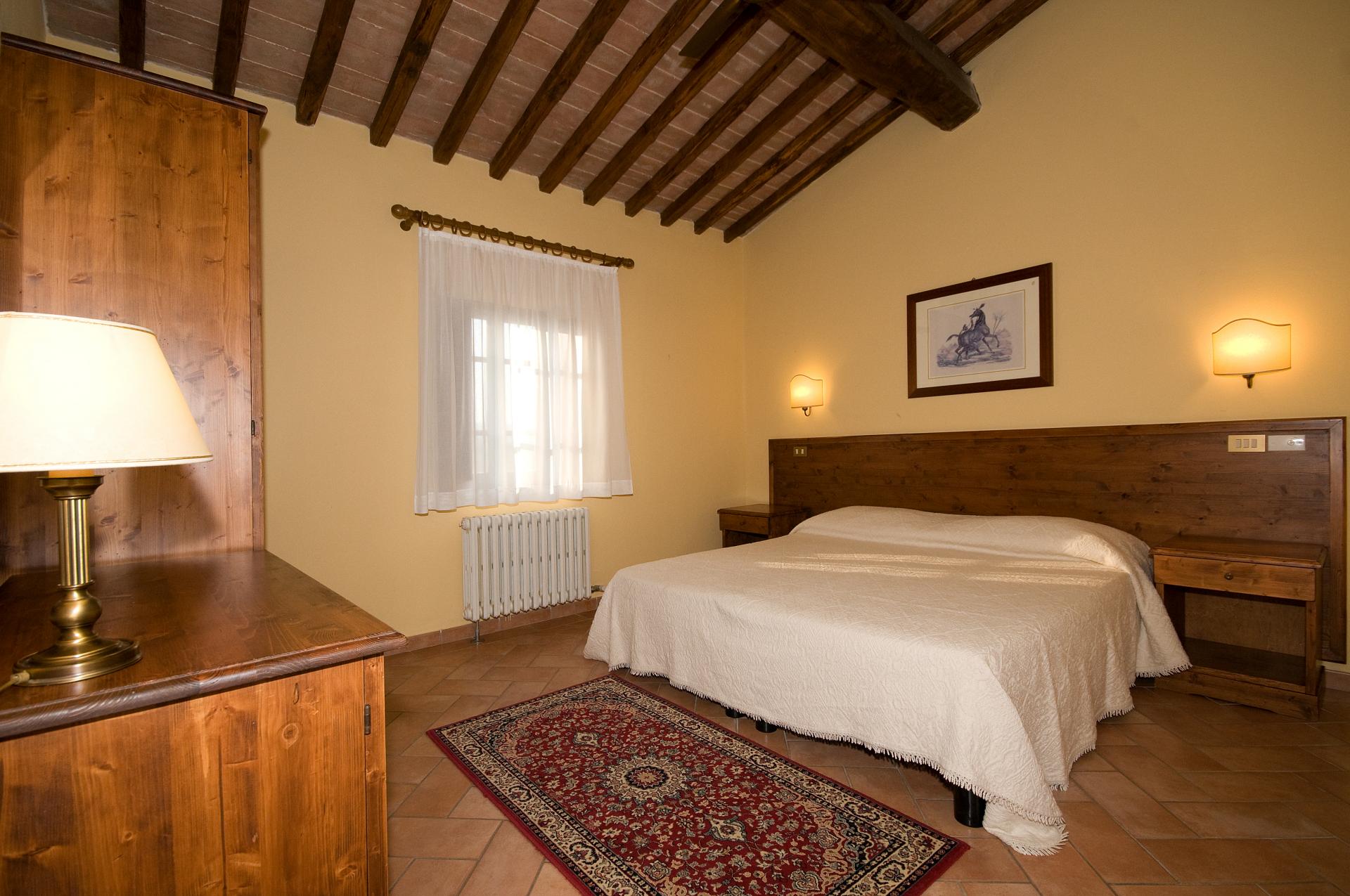 Kindvriendelijke agriturismo hartje toscane huren bij tritt Stenen muur houten plafond